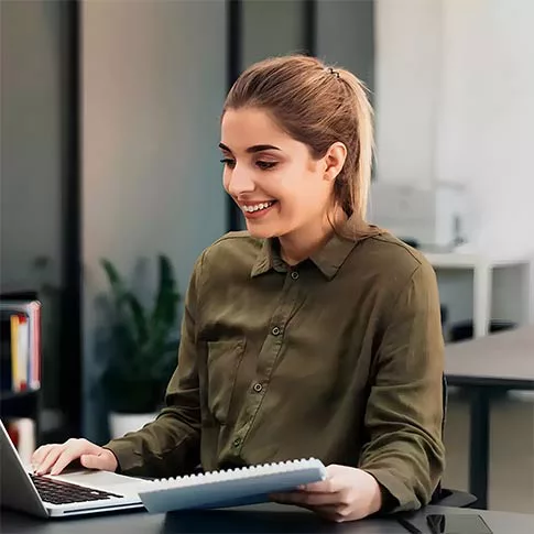 female employee smiling while working