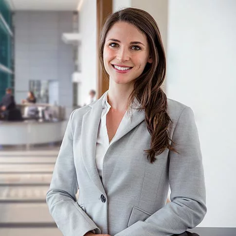 businesswoman standing and smiling